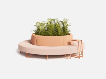 Circular atrium sofa with central office planter