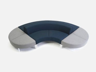 Double sided atrium sofa with central back support